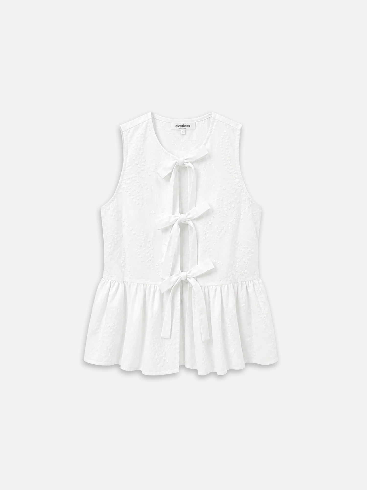 Bluse ALMA in weiß mit drei Schleifen und gesticktem Muster